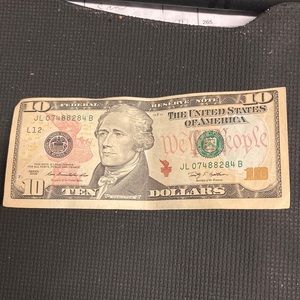 Miss cut $10 bill